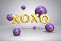 Shiny metal gold letters XOXO and bright flying purple violet balloons spheres on festive background with confetti for Valentines