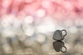 Shiny metal heart lock in red light and bokeh background, sweet Royalty Free Stock Photo