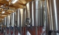 Shiny metal micro brewery tanks Royalty Free Stock Photo