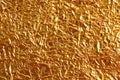 Shiny metal yellow golden texture background. Metallic gold pattern Royalty Free Stock Photo