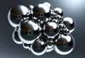 Shiny metallic spheres cluster reflective surfaces dark gray background soft lighting 3D CGI abstract art glossy texture Royalty Free Stock Photo