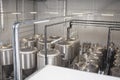 Shiny microbrewery beer tanks at beer factory Royalty Free Stock Photo