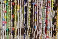 Shiny multi-colored beads made from natural semi-precious stones are beautifully arranged Royalty Free Stock Photo