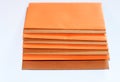 Shiny orange and brown small envelopes