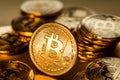 Shiny physical bitcoins on golden background. Blockchain technology