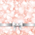 Shiny pink background with gift silver bow Royalty Free Stock Photo