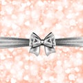 Shiny pink background with gift silver bow Royalty Free Stock Photo