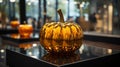 A shiny pumpkin on a black surface