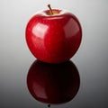 Is a gradient from gray to dark, enhancing the apple\'s vibrant color Royalty Free Stock Photo