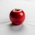 The apple\'s texture appears smooth, and it has a small brown Royalty Free Stock Photo