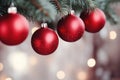 shiny red Christmas ball bouncing in front of blurred Christmas candle light and unfocused bokeh Royalty Free Stock Photo