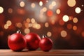 shiny red Christmas ball bouncing in front of blurred Christmas candle light and unfocused bokeh Royalty Free Stock Photo