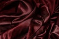 Shiny red fabric. Red wavy fabric background Royalty Free Stock Photo