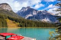 Shiny red kayaks are dried upside down Royalty Free Stock Photo