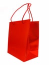 Shiny red shopping / gift bag isolated on white Royalty Free Stock Photo