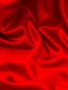 Shiny red silk fabric background Royalty Free Stock Photo