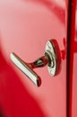 Shiny retro style door handle of old classic car Royalty Free Stock Photo
