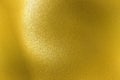 Shiny rough gold metal wall, abstract texture background