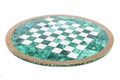 Shiny round green stone empty chess board on isolated background. Royalty Free Stock Photo