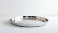 Shiny Round Stainless Steel Tray on White Background Royalty Free Stock Photo