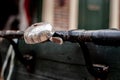 Shiny rusty old vintage bicycle bell from a traditional tricycle