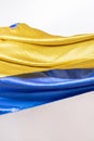 Shiny satin fabrics with the colors of the flag of Ukraine and a white background