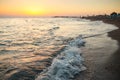 Shiny sea waves on the beach