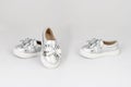 Shiny silver Baby shoes isolated