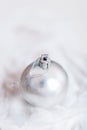 Shiny silver Christmas balls over snow background Royalty Free Stock Photo