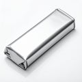 Silver Foil Wrapped Rectangular Object on White Surface with Reflection wrapper Royalty Free Stock Photo