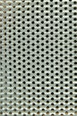 Shiny silver metal pattern with round hole Royalty Free Stock Photo