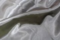 Satin material for backgrounds shiny silver satin Royalty Free Stock Photo