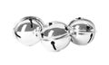 Shiny silver sleigh bells on white background
