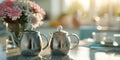 Shiny Silver Teapots Reflecting Soft Sunlight in a Warm Indoor Setting Royalty Free Stock Photo