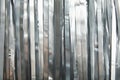 Shiny silver tinsel as background, closeup. Christmas decoration Royalty Free Stock Photo
