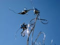 Shiny stainless steel contemporary sculpture in Edwards Gardens in Toronto