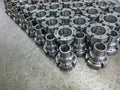 Shiny steel parts after cnc turning and milling, industrial background Royalty Free Stock Photo