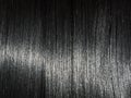 Shiny straight black hair background. Beautiful smooth brunette hair backdrop