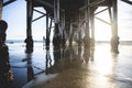 Shiny sun under the pier at Newport Beach, California Royalty Free Stock Photo