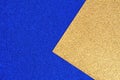 Shiny textured rich blue and gold glitter paper background Royalty Free Stock Photo