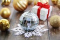 Shiny toy ball for Christmas tree and white a snowflake Royalty Free Stock Photo