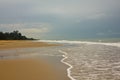 Shiny tropic sea wave on golden beach sand Royalty Free Stock Photo