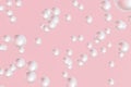 Shiny white sea pearl flying on pink background 3D rendering Royalty Free Stock Photo