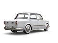 Shiny white vintage old compact car - back side down view Royalty Free Stock Photo