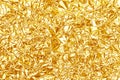Shiny yellow gold foil texture for background and shadow. Crease