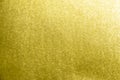 Shiny yellow gold leaf foil texture background Royalty Free Stock Photo