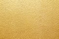 Shiny yellow leaf gold foil texture background Royalty Free Stock Photo