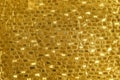 Shiny yellow leaf gold foil texture background Royalty Free Stock Photo