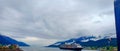 Ship approaching through a inside passage in Alaska