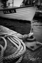 a ship is attached to a bollard in the harbor Royalty Free Stock Photo